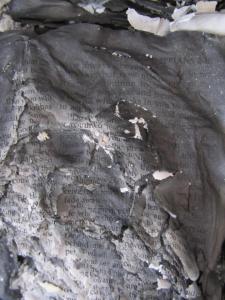 A bible scorched in the fire...but the words of life survive.